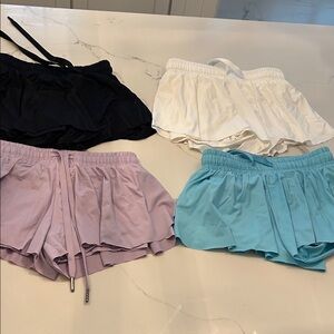 4 pair Liberty Pro girls butterfly shirts. $15 for the lot.